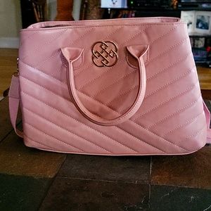 New light pink shoulder purse.